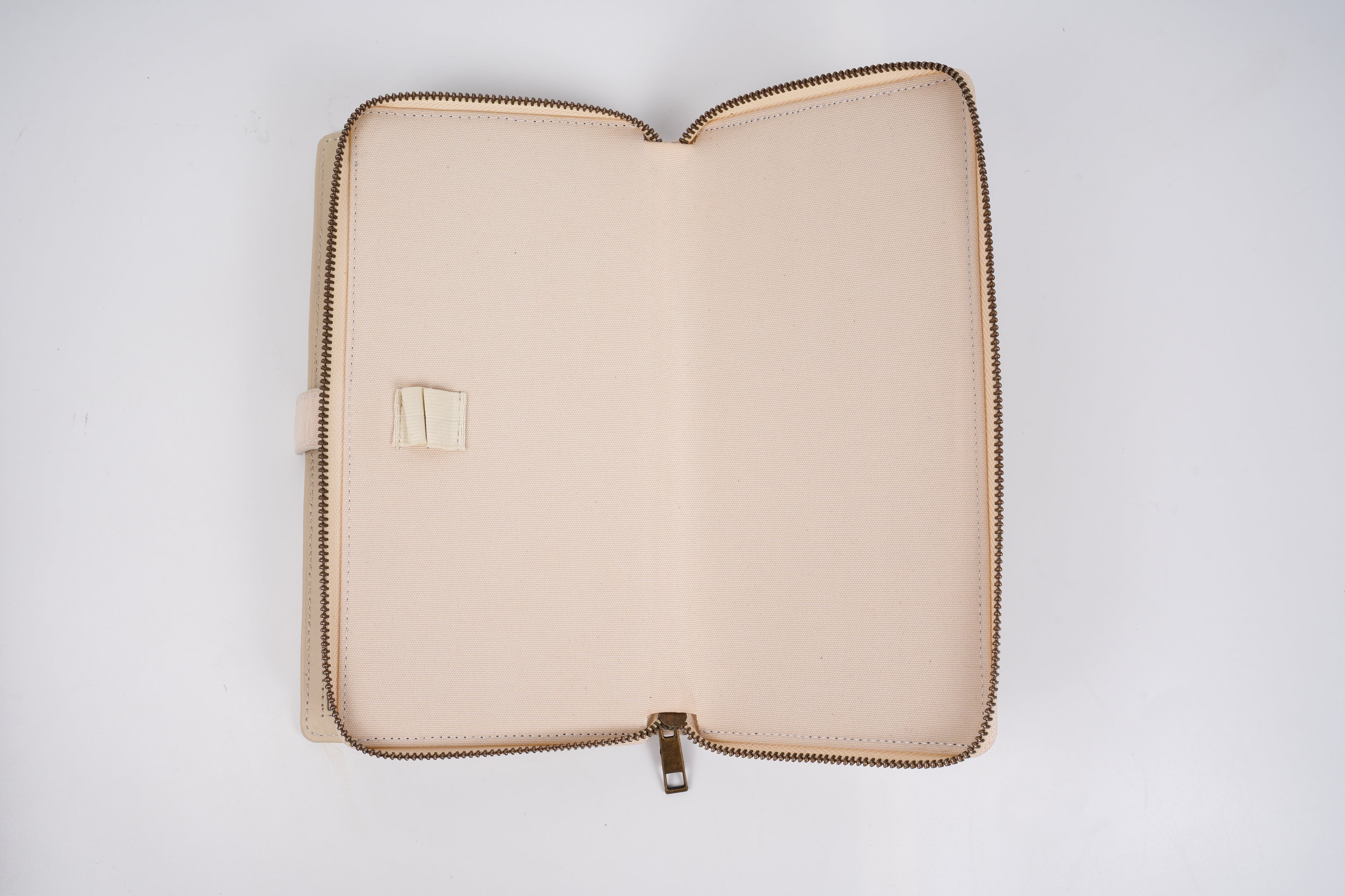 Beige zippered pouch on a white background