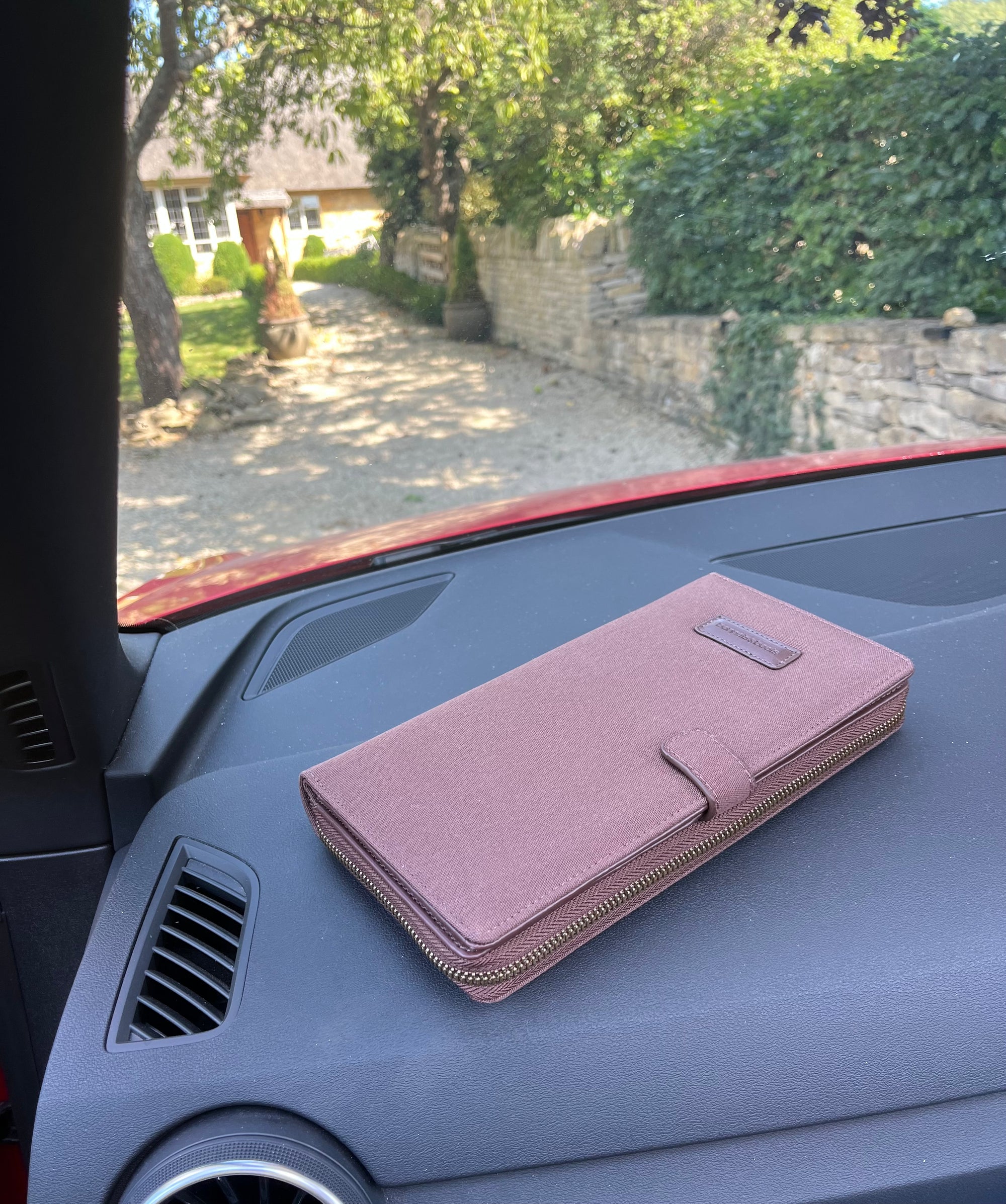 brown car document holder
