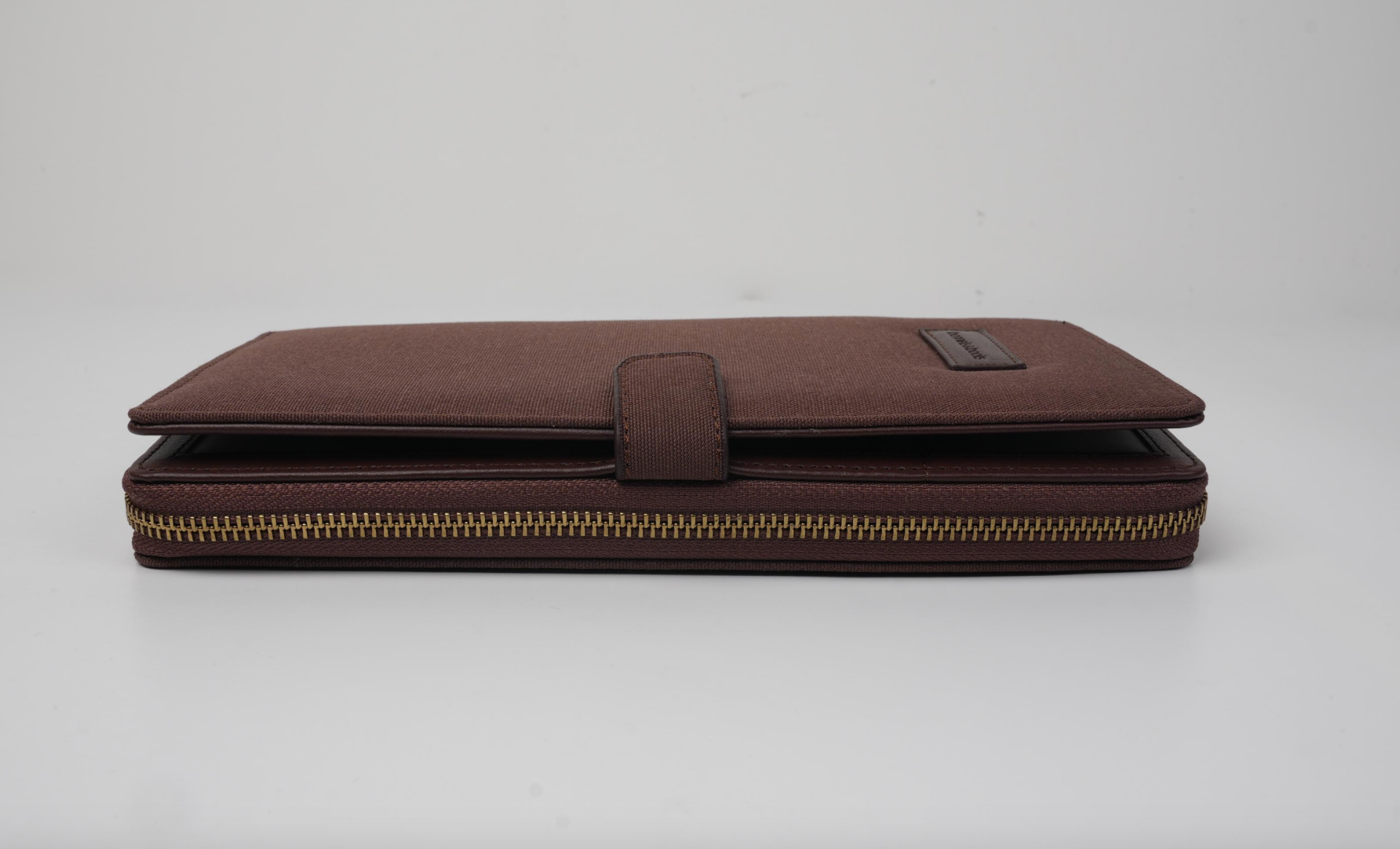 brown document holder with zipper
