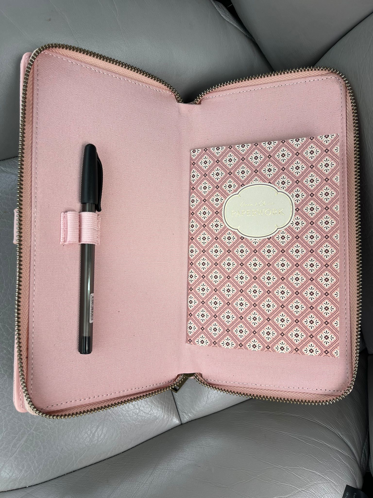 Pink car document holder open